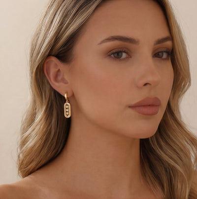 حلق الكلوفر الأبيض الدهب