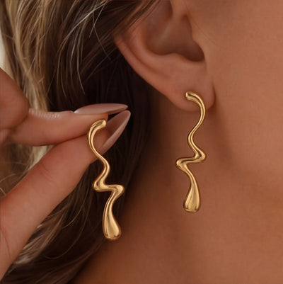 حلق أجنحة الفراشة الدهب